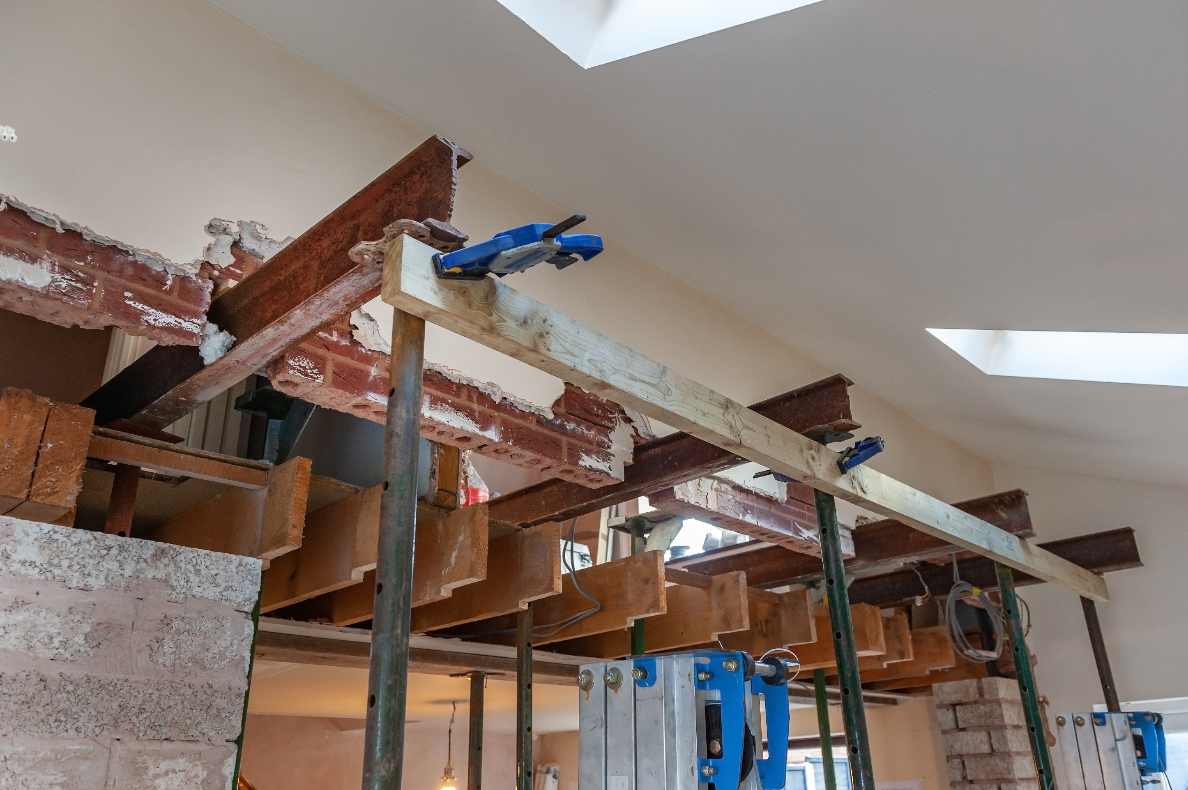 Structural beam reinforcement during home renovation