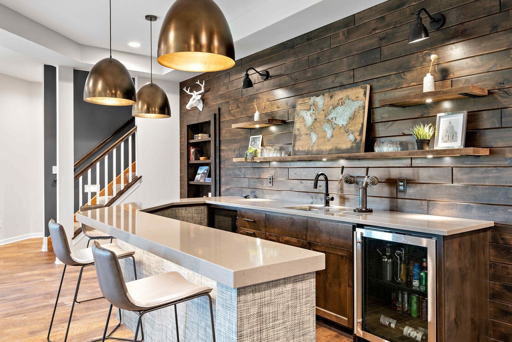 Custom basement wet bar with shiplap accent wall